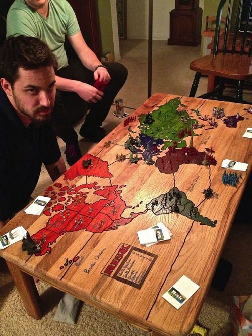 ↑ A Risk Board Carved into a Coffee Table